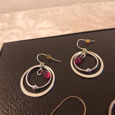 4 sets of earrings and one bracelet