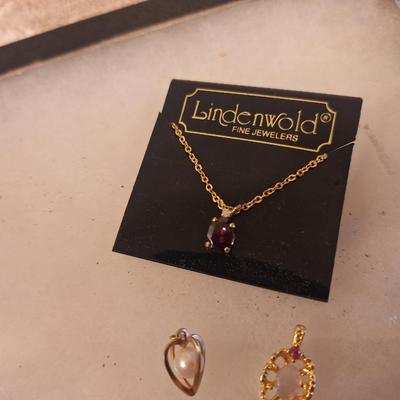 gold tone necklace with extra pendant and misc other item