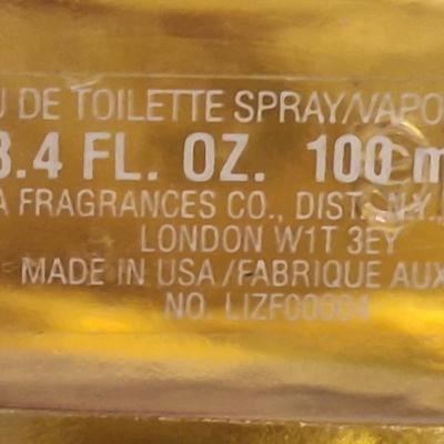 2 bottles of fragrance  1.  Lancôme Poême Eau de Parfum. And 2.  Lix Claiborn Triangle Eau De Toilette