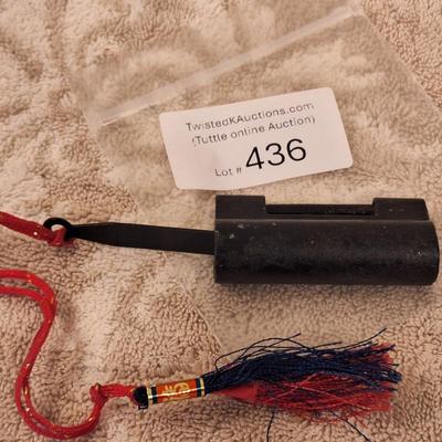  vintage Chinese traditional-style padlock and key with a tassel.