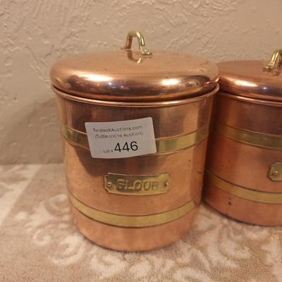 vintage set of four coppoer kitchen canisters with brass handles