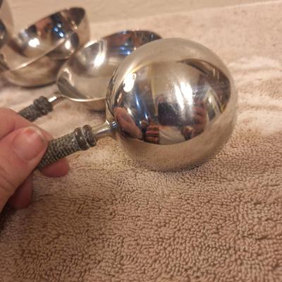 Not sure…they seem to be measuring cups but have no markings, they are heavier than typical as well.