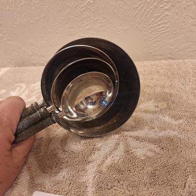 Not sure…they seem to be measuring cups but have no markings, they are heavier than typical as well.