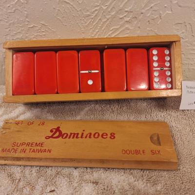 Vintage set of red Supreme brand double six dominoes in wooden box