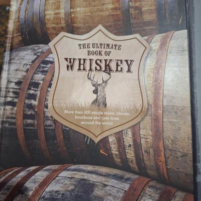 The Ultimate Book of Whiskey. 
It is a two-book box set that includes a comprehensive guide to global whiskeys and a whiskey tasting log.