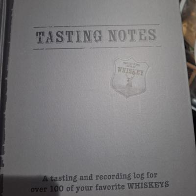 The Ultimate Book of Whiskey. 
It is a two-book box set that includes a comprehensive guide to global whiskeys and a whiskey tasting log.