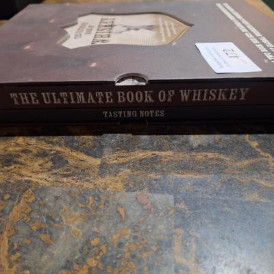 The Ultimate Book of Whiskey. 
It is a two-book box set that includes a comprehensive guide to global whiskeys and a whiskey tasting log.