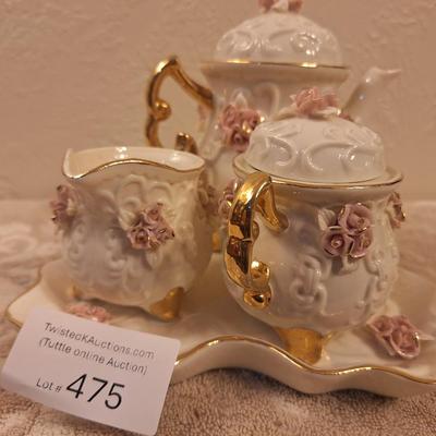  Cracker Barrel vintage ivory porcelain tea set featuring a delicate pink rose motif and 10K gold trim plating