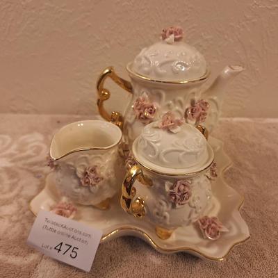  Cracker Barrel vintage ivory porcelain tea set featuring a delicate pink rose motif and 10K gold trim plating