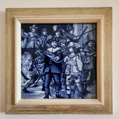 Sale Photo Thumbnail #160: This lot is for a Rembrandt on Delft Blue Tile. This tile displays a reproduction of Rembrandt van Rijn's famous painting, The Night Watch.  Nicley framed from the 1950s.  The original painting is in Amsterdam but you can have this nifty reproduction if y