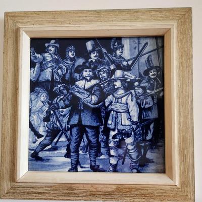 Sale Photo Thumbnail #162: This lot is for a Rembrandt on Delft Blue Tile. This tile displays a reproduction of Rembrandt van Rijn's famous painting, The Night Watch.  Nicley framed from the 1950s.  The original painting is in Amsterdam but you can have this nifty reproduction if y