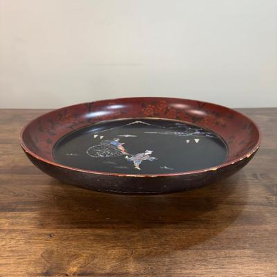 An Oriental Picture In Red Lacquered Frame