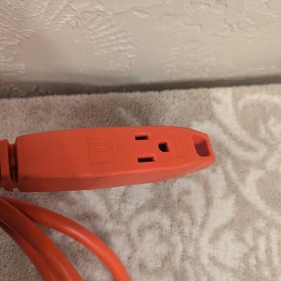 8 ft heavy duty extension cord with 3 outlets.