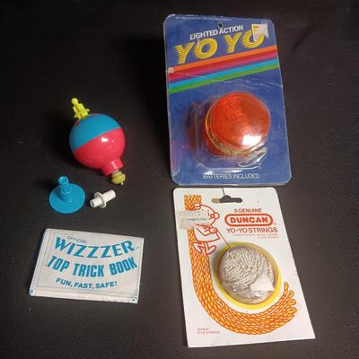 WIZZZER TRICK TOP, LIGHTED YOYO AND DUNCAN YOYO STRING