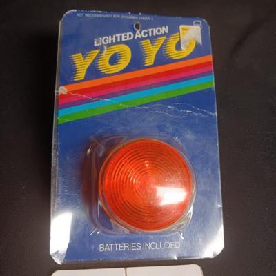 WIZZZER TRICK TOP, LIGHTED YOYO AND DUNCAN YOYO STRING