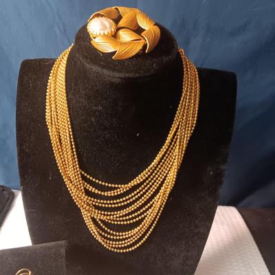 MULTI CHAIN NECKLACE, BROOCH, SMALL BOW PIN AND CLIP ON EARRINGS