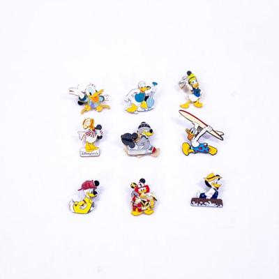 Sale Photo Thumbnail #353: Nine Donald Duck pins some including hidden mickey's in good condition.