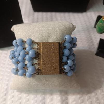 GREEN GLASS BEADED LONG NECKLACE, CLIP ON AND SCREW BACK EARRINGS, MULTI STRAND BRACELET AND MORE