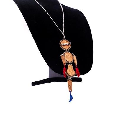 Sale Photo Thumbnail #426: This is an upcycled, industrial- inspired bottle cap necklace featuring various soda bottle caps, including "Old Colony Grape Soda,' "Lymette," and "Black".