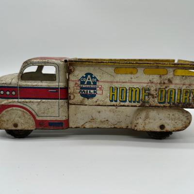 Vintage Marx “Home Dairy” Tin Milk Truck – Pressed Steel Toy