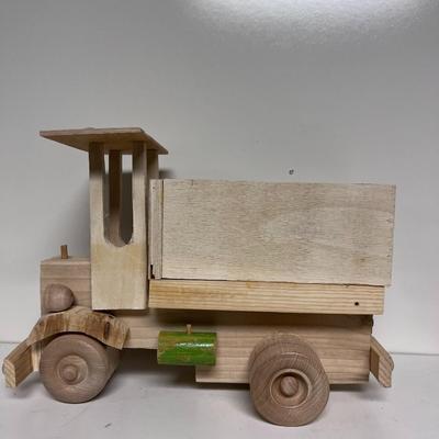 HAND CRAFTED WOODEN TOYS WITH AN EMBEDDED PENNY FOR DATE MADE