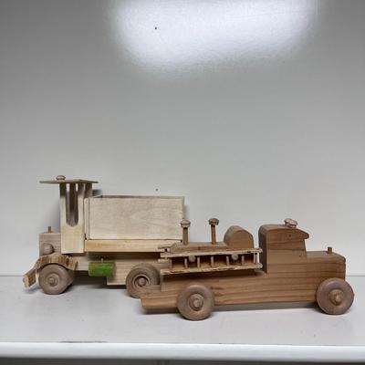 HAND CRAFTED WOODEN TOYS WITH AN EMBEDDED PENNY FOR DATE MADE