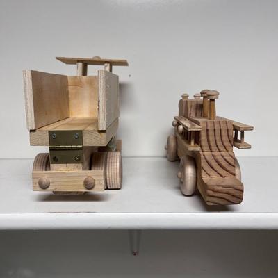 HAND CRAFTED WOODEN TOYS WITH AN EMBEDDED PENNY FOR DATE MADE