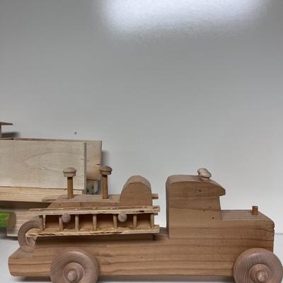 HAND CRAFTED WOODEN TOYS WITH AN EMBEDDED PENNY FOR DATE MADE