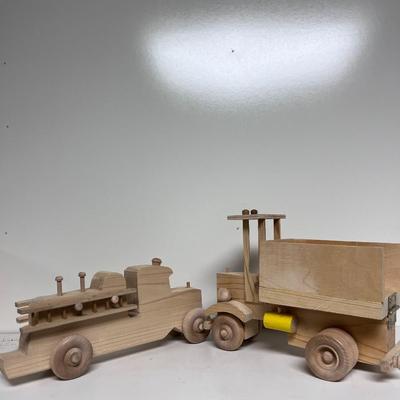 HAND CRAFTED WOODEN TOYS WITH AN EMBEDDED PENNY FOR DATE MADE