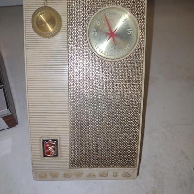 SYLVANIA TRANSISTOR RADIO AND A WEATHER ALERT