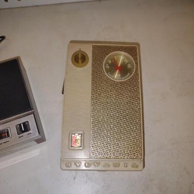 SYLVANIA TRANSISTOR RADIO AND A WEATHER ALERT