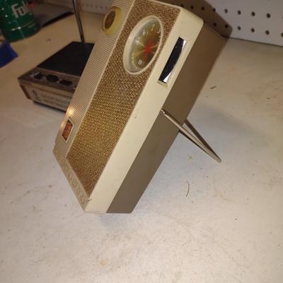 SYLVANIA TRANSISTOR RADIO AND A WEATHER ALERT
