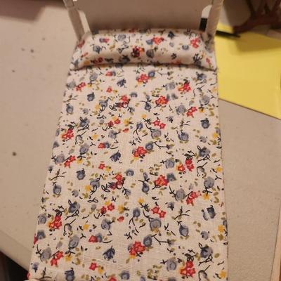 White, Blue, and Red Floral Bed