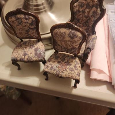 Multicolored Cloth and Wood Chairs