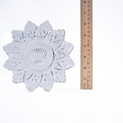 Sale Photo Thumbnail #446: This is a Federal Glass "Petal Clear" pressed glass bowl or pate. It features a distinctive flower-like, starburst design with a clear finish.