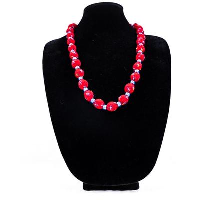 Sale Photo Thumbnail #457: This is a red and bue beaded necklace.