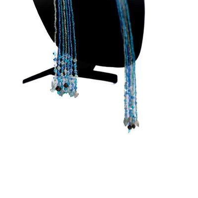 Sale Photo Thumbnail #461: This is a multistrand seed bead necklace in shades of blue, green, and white.