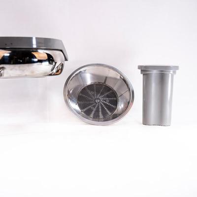 Sale Photo Thumbnail #478: This is a compact centrifugal juicer with a heavy-duty 2/3 horsepower universal motor. The juicer features a patented pulp ejection system for continuous juicing.