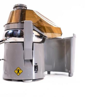 Sale Photo Thumbnail #481: This is a compact centrifugal juicer with a heavy-duty 2/3 horsepower universal motor. The juicer features a patented pulp ejection system for continuous juicing.
