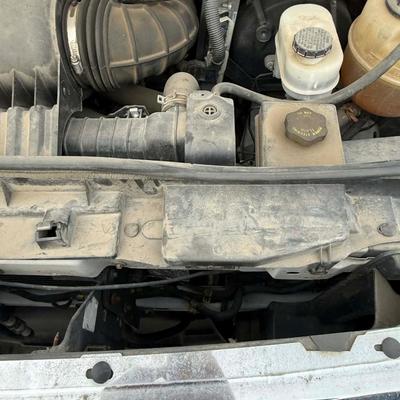 Sale Photo Thumbnail #28: Vehicle runs and drives, start right up. Does have a strong chic after about 60 mph. Great for in town driving. One of the side mirrors is broken and held together by a bungee cord.