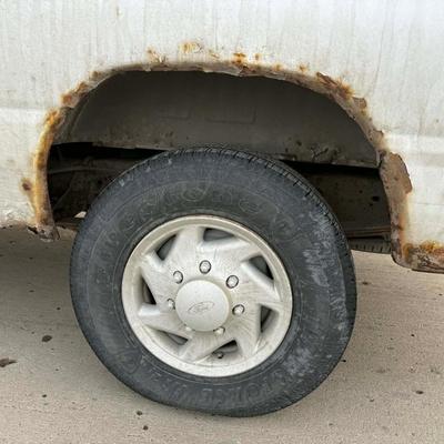 Sale Photo Thumbnail #35: Vehicle runs and drives, start right up. Does have a strong chic after about 60 mph. Great for in town driving. One of the side mirrors is broken and held together by a bungee cord.