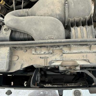 Sale Photo Thumbnail #29: Vehicle runs and drives, start right up. Does have a strong chic after about 60 mph. Great for in town driving. One of the side mirrors is broken and held together by a bungee cord.