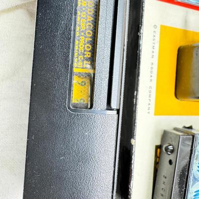 Sale Photo Thumbnail #392: All untested  1 Land camera with case, 2 One step Polaroids, one with brown leather case. 2 Instamatic Kodaks one with some used film inside. Extra gear flashes in an original box.   This is a Tokina RMC 80-200mm f/4 telephoto zoom lens. It is a manual fo