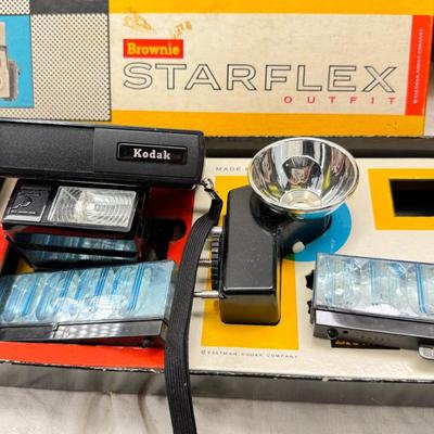 Sale Photo Thumbnail #393: All untested  1 Land camera with case, 2 One step Polaroids, one with brown leather case. 2 Instamatic Kodaks one with some used film inside. Extra gear flashes in an original box.   This is a Tokina RMC 80-200mm f/4 telephoto zoom lens. It is a manual fo