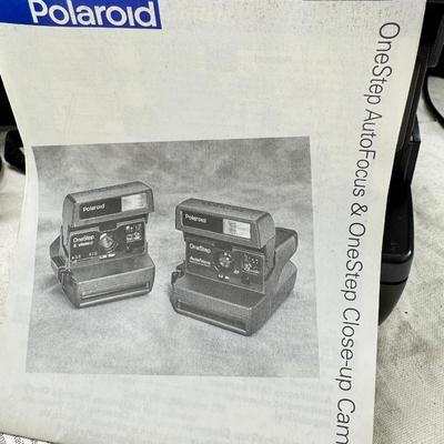 Sale Photo Thumbnail #388: All untested  1 Land camera with case, 2 One step Polaroids, one with brown leather case. 2 Instamatic Kodaks one with some used film inside. Extra gear flashes in an original box.   This is a Tokina RMC 80-200mm f/4 telephoto zoom lens. It is a manual fo