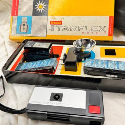 Sale Photo Thumbnail #391: All untested  1 Land camera with case, 2 One step Polaroids, one with brown leather case. 2 Instamatic Kodaks one with some used film inside. Extra gear flashes in an original box.   This is a Tokina RMC 80-200mm f/4 telephoto zoom lens. It is a manual fo