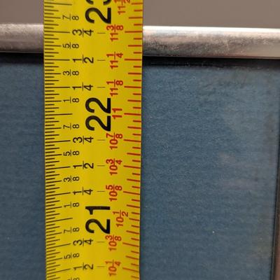 Print of a cabin, snow, and chairs. “Crisp and Deep,” 28/75, Shell. Approx 15 1/4" x 22/3/4" #38