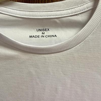 Sale Photo Thumbnail #506: Light-color short-sleeve t-shirt with from-side graphic. Size M, good used condition.