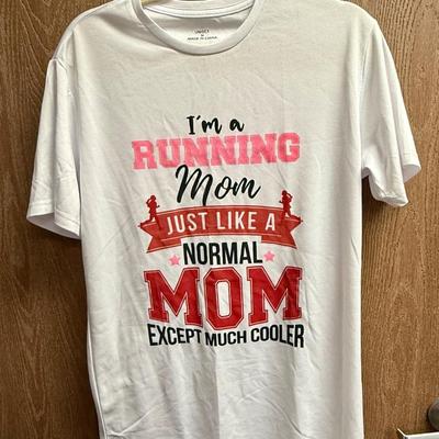 Sale Photo Thumbnail #504: Light-color short-sleeve t-shirt with from-side graphic. Size M, good used condition.