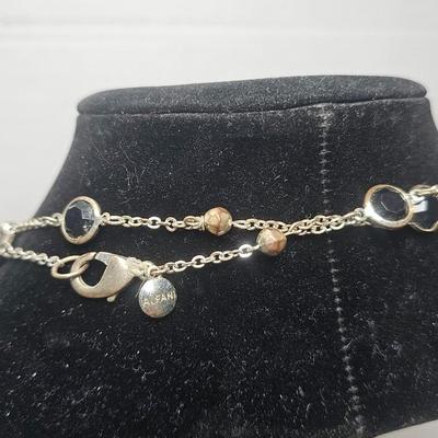 Layered Gold-Tone Chain Necklace with Faceted Black Stone Accents